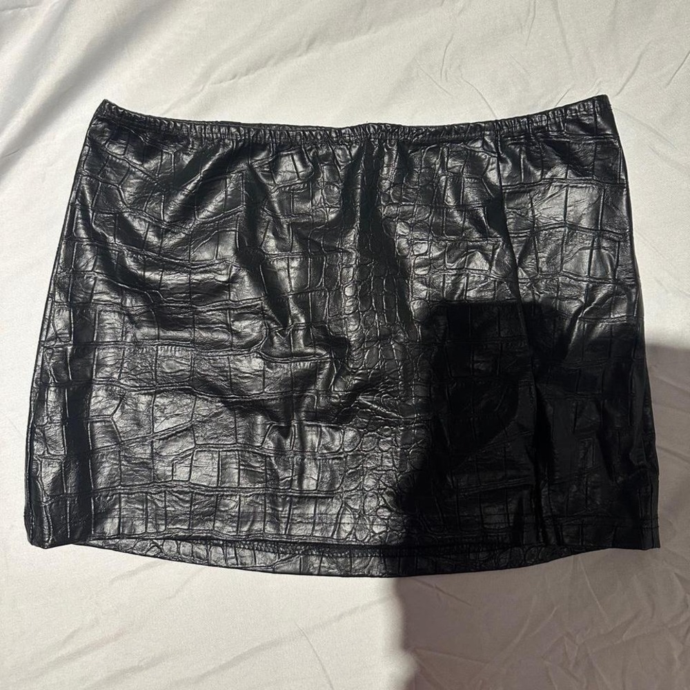Black faux leather mini skirt